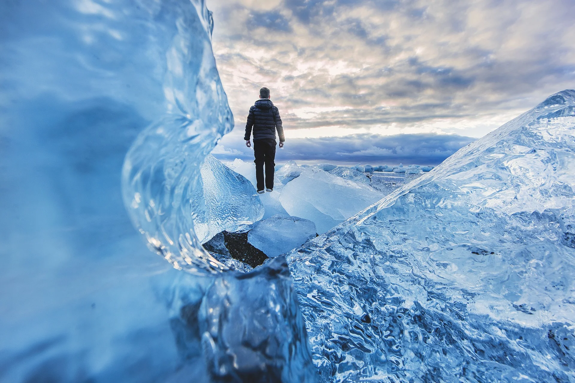 Man walking on translucent ice path