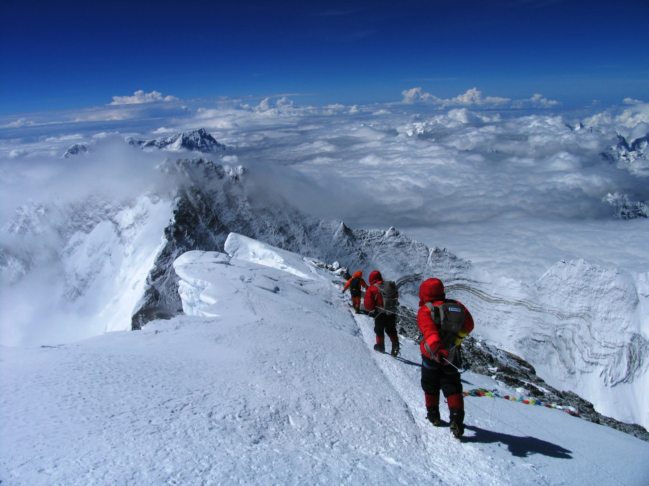 Alan Mallory with his father and brother descending from the summit of Everest